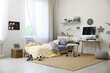 © New Africa - Stylish teenager's room interior with comfortable bed and workplace