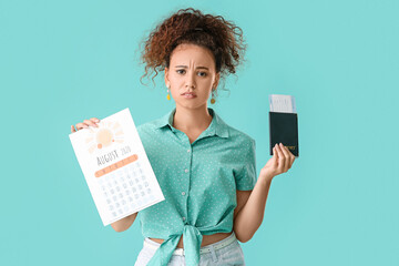 Sticker - Sad woman with calendar, passport and ticket on color background. Vacation concept