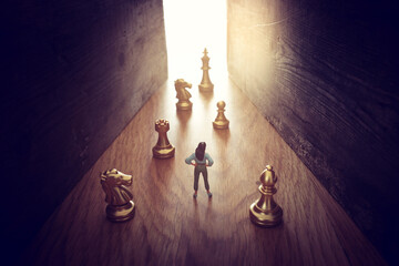Woman walks on an unknown road and chess at the end