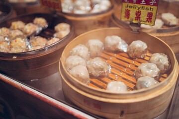 Wall Mural - Closeup shot of a shop with Hong Kong food in Traditional night market in Zhubei, Taiwan