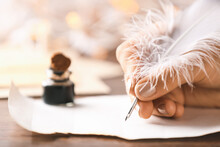 Woman Writing Letter With Feather Pen, Closeup