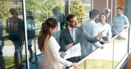 Canvas Print - Business people talking nad brainstorming in break outdoor