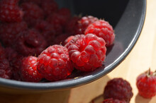 Sunny Background With Raspberries. Background With Ripe Berries.