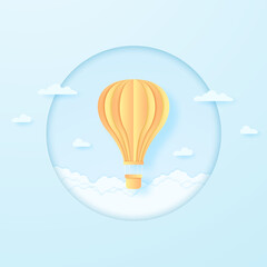 Wall Mural - bright hot air balloon flying in the blue sky and cloudscape, paper art style