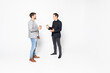© F8  \ Suport Ukraine - Young two men corporate executives standing and talking with coffee, isolated on white background.