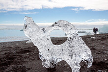 Naturally Sculptured Icebergs Stranded On A Black Lava Beach Along The Atlantic Ocean, Near The Outlet Of Jokulsarlon Lagoon; Part Of The Vatnajokull Glacier National Park