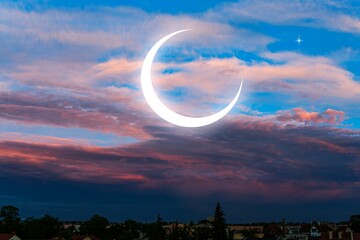 Wall Mural - fiery red sunset over the city . generous ramadan
