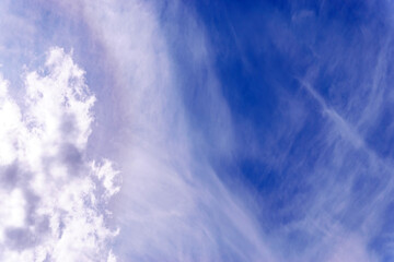 Wall Mural - Cirrus clouds give out rain that reaches the ground. in the sky background, texture.