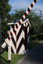 Striped Booth And Gate At The Park Entrances