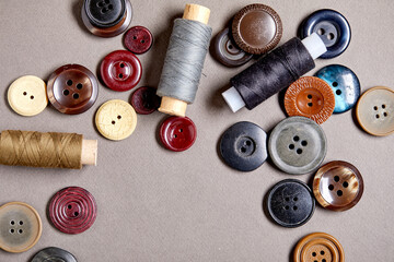 Fototapete - Background and texture of multicolored antique buttons