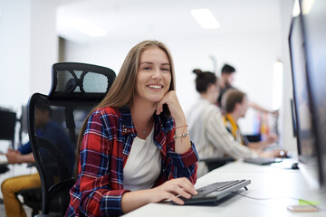 Poster - casual business woman working on desktop computer