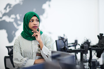 Wall Mural - portrait of african muslim business woman at office