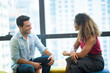 © chokniti - success and winning concept - happy business team celebrating victory in coworking space