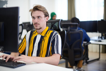 Poster - casual business man working on desktop computer