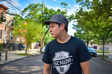 Wall Mural - portrait of a young man on a hat