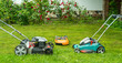 © Sergey + Marina - Three types of lawn mowers opposite each other - gasoline, electric and robot