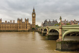 Fototapeta Big Ben - Big Ben by Westminster Bridge and the River Thames on a cloudy day in London