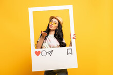 Brunette Girl In Summer Outfit Posing Blowing Kiss In Social Network Frame On Yellow Background