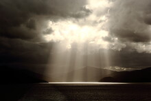 Rays Of Light Through Clouds