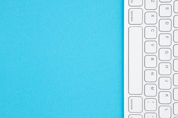 Wall Mural - Gray keyboard on a blue background