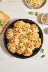 Sticker - Delicious cheese bubble pizza bread with ingredients and cheese on a white table