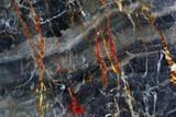 Fototapeta Desenie - Red, yellow and white patterned structure of dark gray marble pattern (Russia Gold) texture.