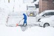 © ChompopsonG - Fresh white snow falling at public park cover road and car in winter season at Kawaguchiko,Japan.