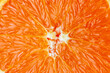 © fotofabrika - Sliced half of juicy orange close up