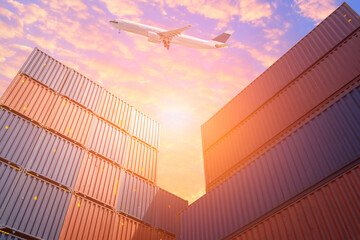 Wall Mural - Cargo Flight flying over Colourful stack of cargo shipping containers in shipping yard.Photo concept for Global business containers shipping,Logistic,Import and Export industry.