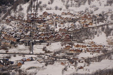panoramic view of a ski resort village  in the french alps from the cable car