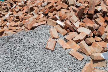 Wall Mural - The pile contains small gray gravel and old bricks.