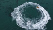 A Fast Motor Boat Making A Circle On The Water
