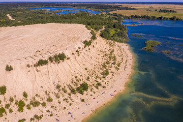 Wall Mural - Aerial view of a sand pit in the form of dunes in Russia