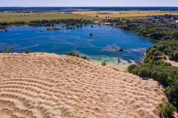 Wall Mural - Aerial view of a sand pit in the form of dunes in Russia
