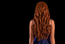 Beautiful Young Redhead Woman On Dark Background, Back View
