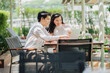 © Me studio - Photos of Asian couple, husband, looking for information on looking after their first child and relaxing by the pool.