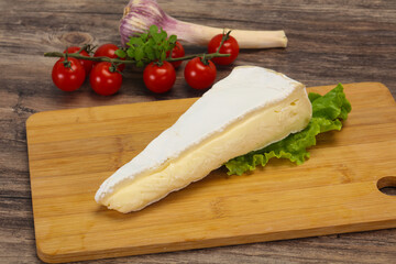 Brie cheese triangle served salad