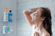 © PBXStudio - Beautiful woman taking shower in her bathroom.