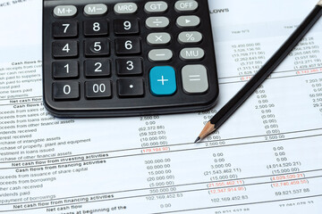 Pencil And Calculator On Financial Report - Business Accounting Concept