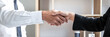 © Freedomz - Male candidate shaking hands with Interviewer or employer after a job interview