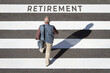 © Formatoriginal - Retirement concept. Scene of a senior man walking in a crosswalk towards retirement text. Top view
