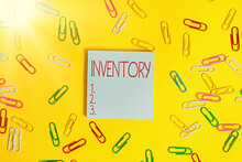 Writing Note Showing Inventory. Business Concept For List Of Traits, Preferences, Attitudes, Interests, Or Abilities Flat Lay Above Empty Paper With Copy Space And Colored Paper Clips