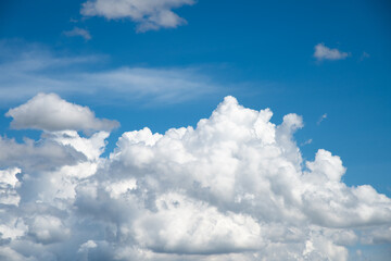 White on blue sky background.