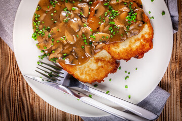 Poster - Crispy potato pancakes with mushroom sauce