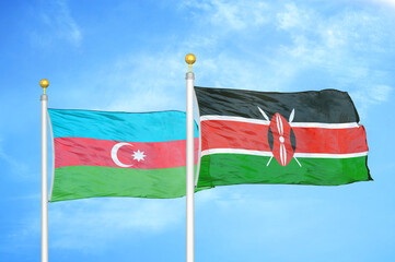 Azerbaijan and Kenya two flags on flagpoles and blue sky