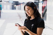© Gillian Vann/Austockphoto - asian woman at train station
