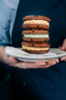 © Joanne O'Keefe/Austockphoto - Three delicious biscuits stacked on a plate.
