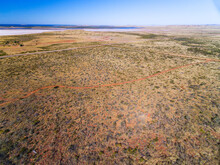 Aerial View Of Arid Country Towards The Sea