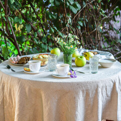 Wall Mural - coffee and breakfast on the table outdoor country terrace
food background top view copy space for text organic healthy eating