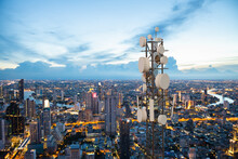 Telecommunication Tower With 5G Cellular Network Antenna On Night City Background